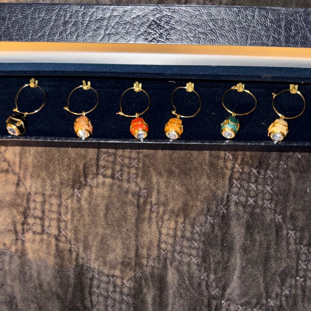 Set of six Enameled Faberge egg wine charms